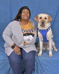 Briasa and her yellow Lab guide dog Journey