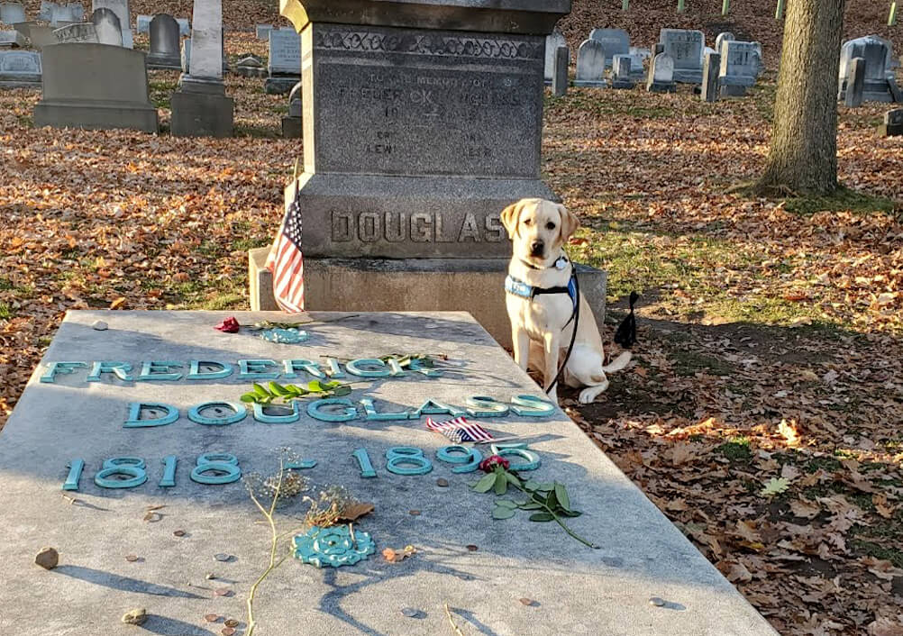 Nita sits at the gravesite of abolitionist
Frederick Douglass