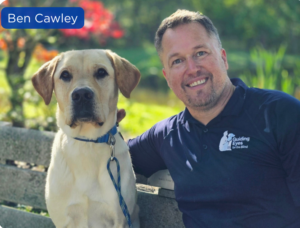 Ben Cawley with a yellow Lab