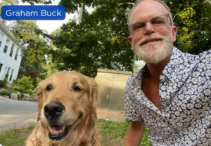 Graham Buck with an older yellow Lab